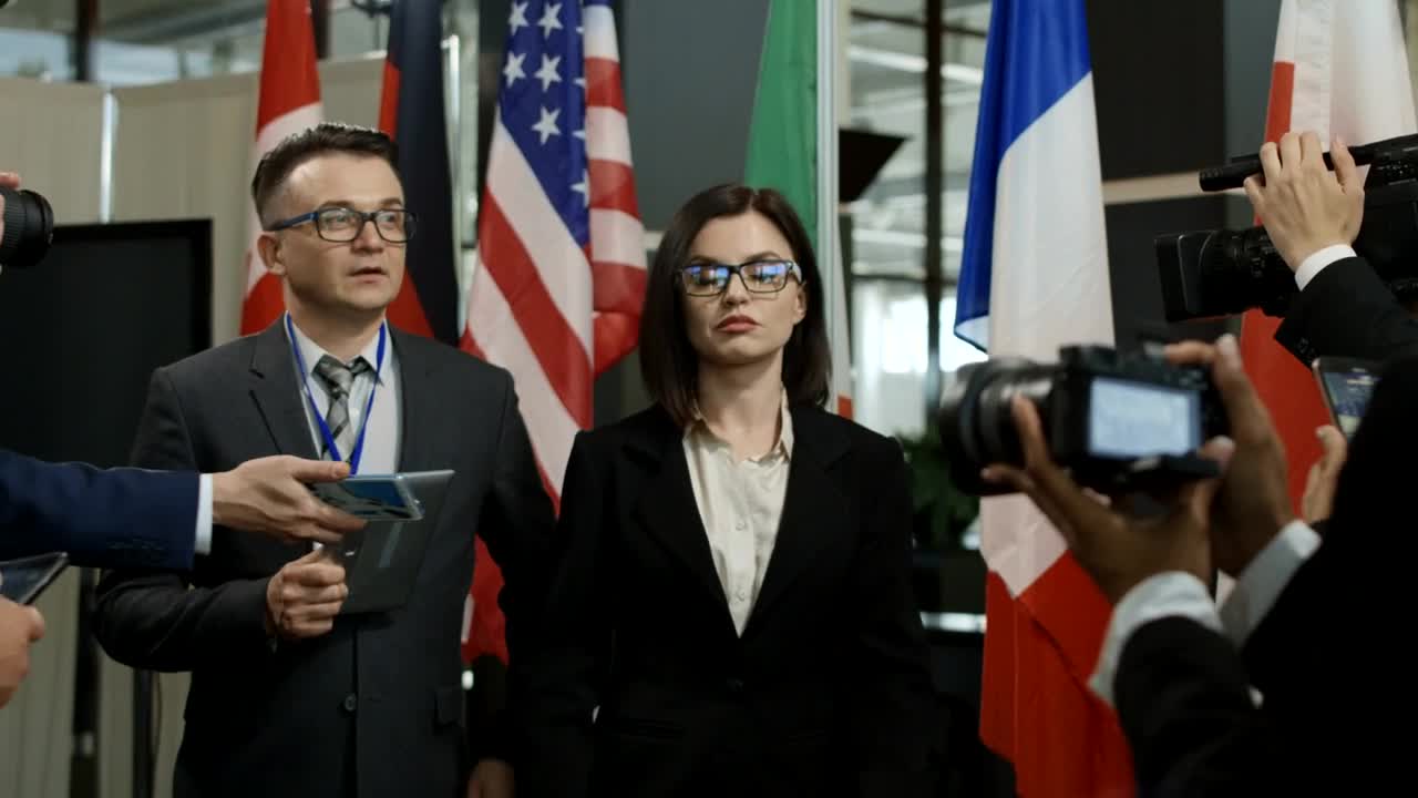 Stock Video A Woman Walks Away From Journalists Live Wallpaper For PC