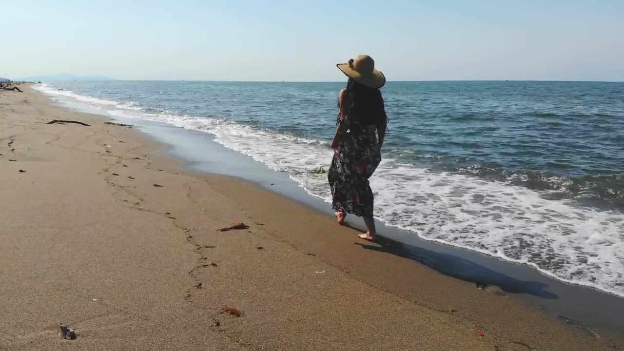 Stock Video A Woman Walking In A Deserted Beach Live Wallpaper For PC