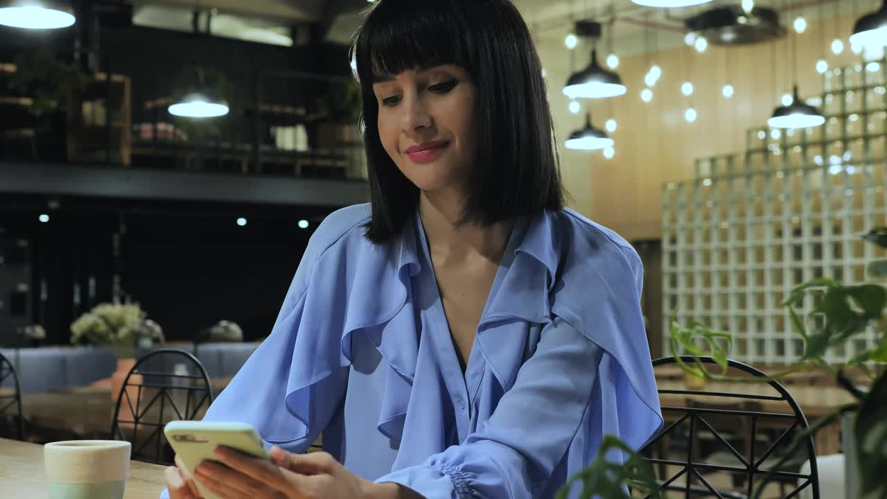 Stock Video A Woman Using Her Smartphone Live Wallpaper For PC