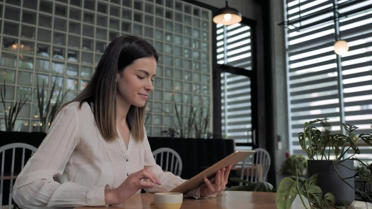 Stock Video A Woman Using A Tablet Live Wallpaper For PC