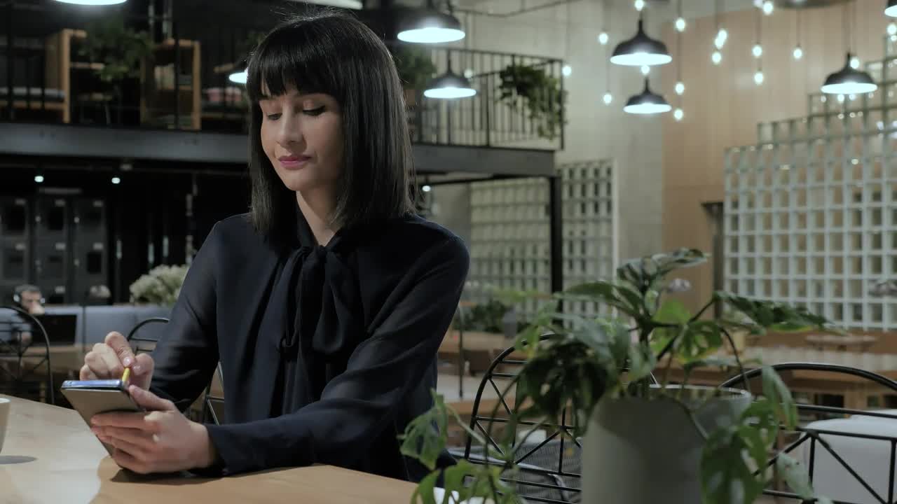 Stock Video A Woman Using A Smartphone Live Wallpaper For PC