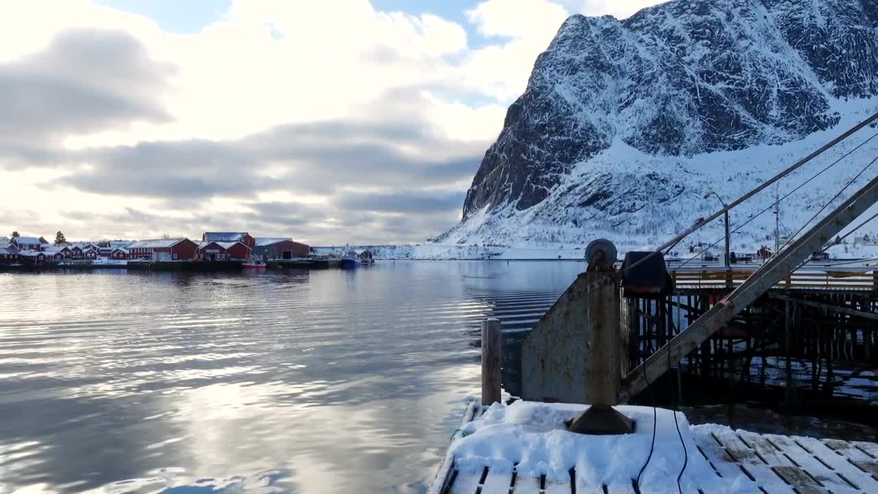Stock Video A Woman Taking A Photo Of A Snowy Mountain Live Wallpaper For PC