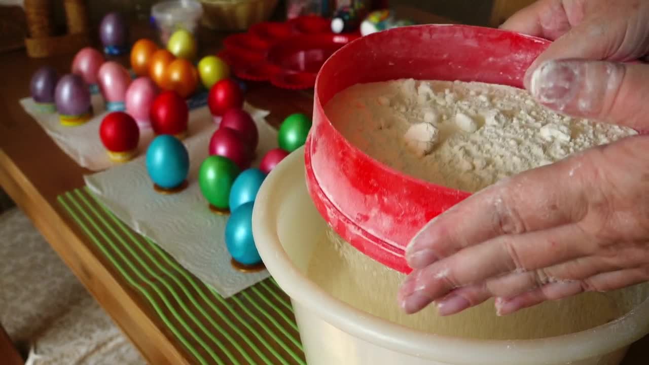 Stock Video A Woman Stirs Flour In The Kitchen Live Wallpaper For PC