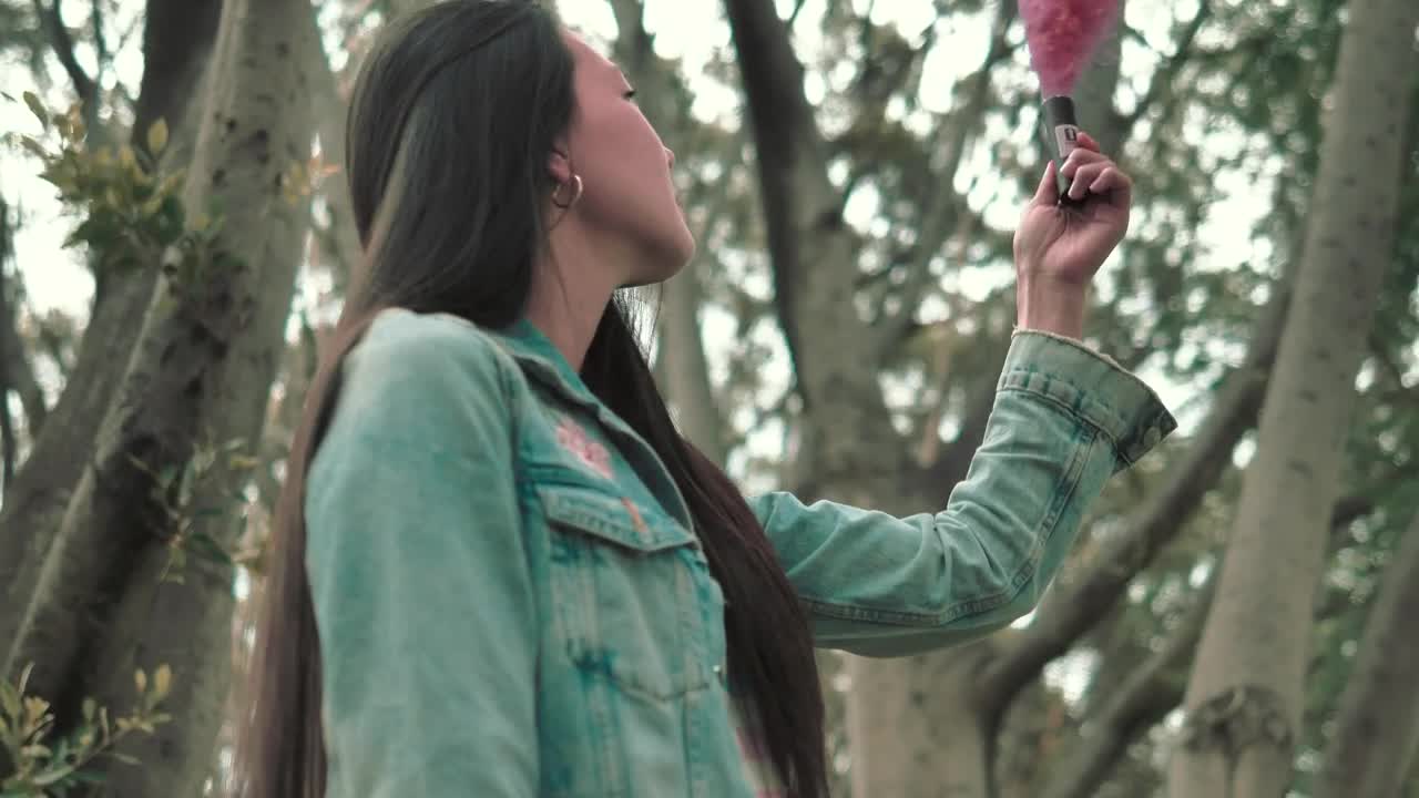 Stock Video A Woman Holding A Pink Smoke Bomb Live Wallpaper For PC