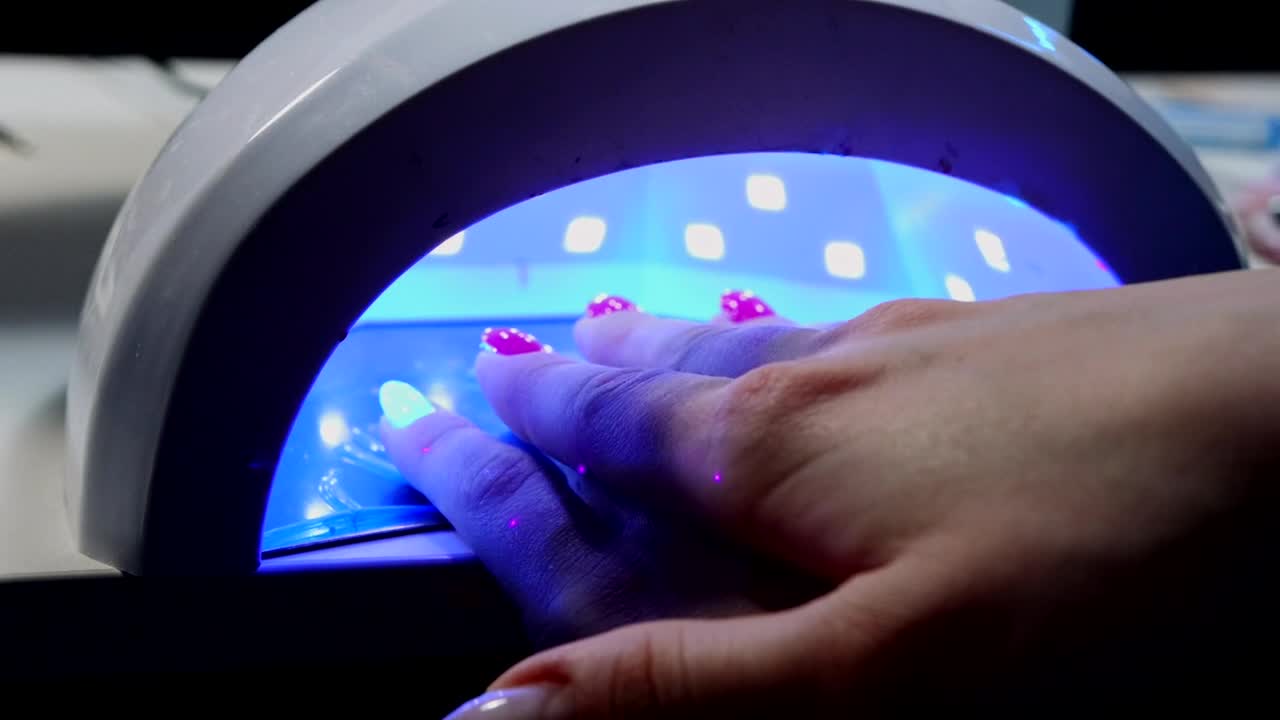 Stock Video A Woman Hand In A Uv Lamp Live Wallpaper For PC