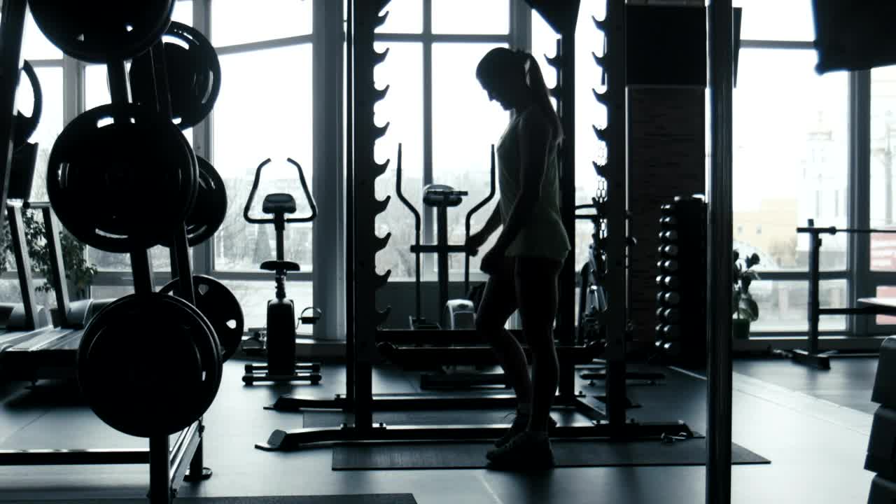 Stock Video A Woman Doing Squats In The Gym Live Wallpaper For PC