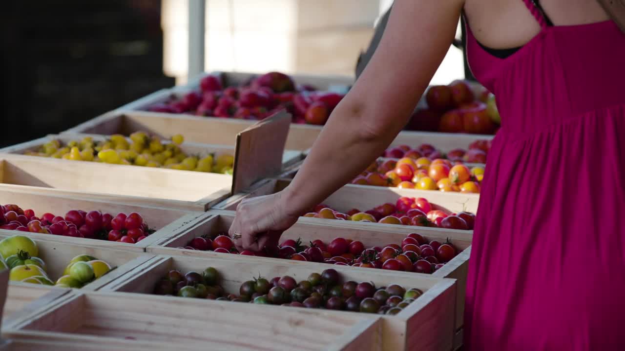 Stock Video A Woman Choosing Fruit At A Market Live Wallpaper For PC