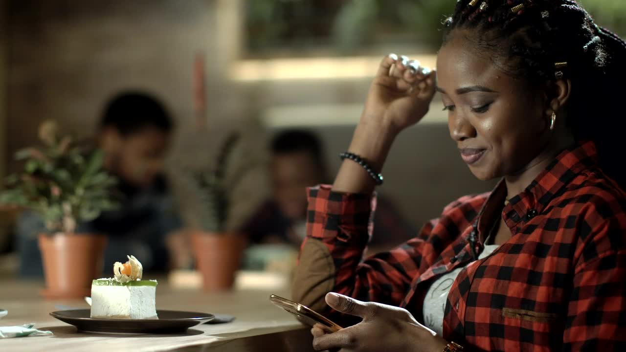Stock Video A Woman Checking Her Phone At The Cafe Live Wallpaper For PC