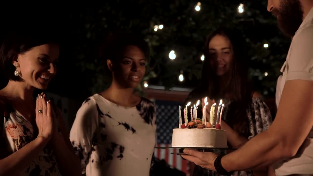 Stock Video A Woman Blows The Candles Of The Birthday Cake Live Wallpaper For PC