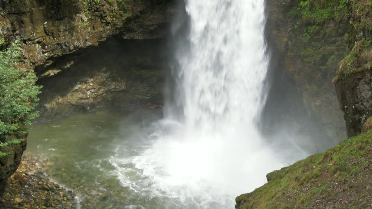 Stock Video A Waterfall Surrounded By Mossy Rocks Live Wallpaper For PC