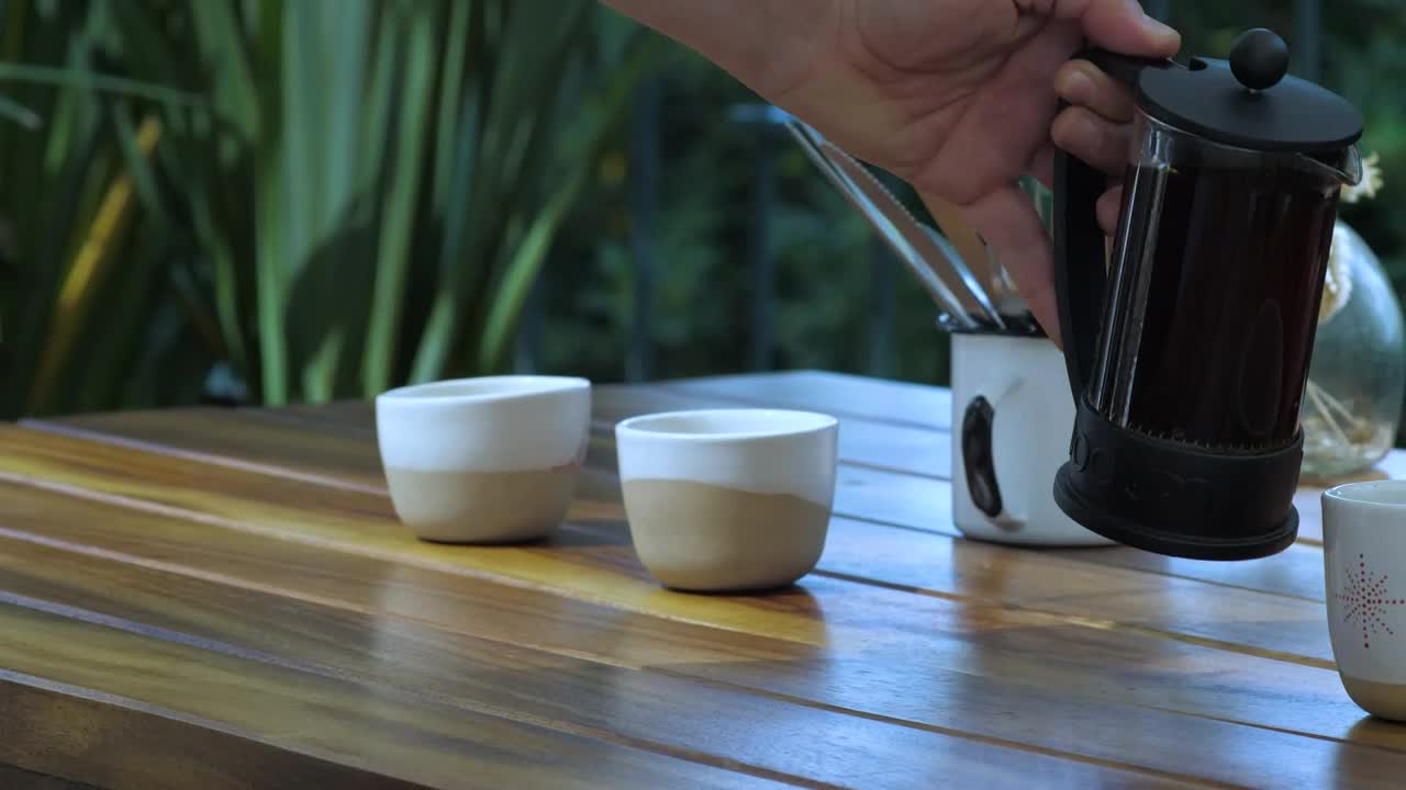 Stock Video A Waiter Serves Coffee To A Customer Live Wallpaper For PC