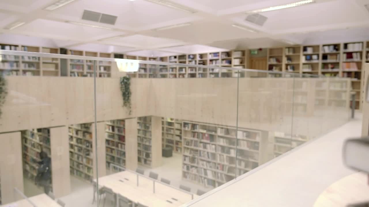 Stock Video A Tired Student In The Library Live Wallpaper For PC