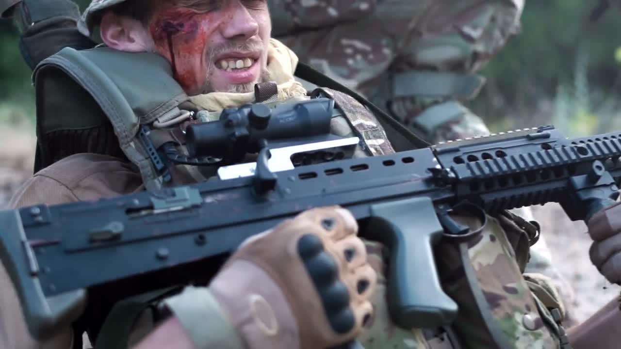 Stock Video A Soldier Wounded Grabbed By His Teammates Live Wallpaper For PC