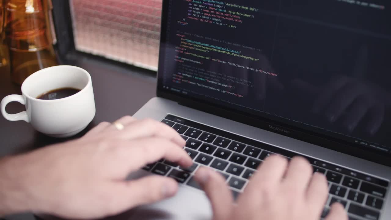 Stock Video A Software Developer Working And Drinking Coffee Live Wallpaper For PC