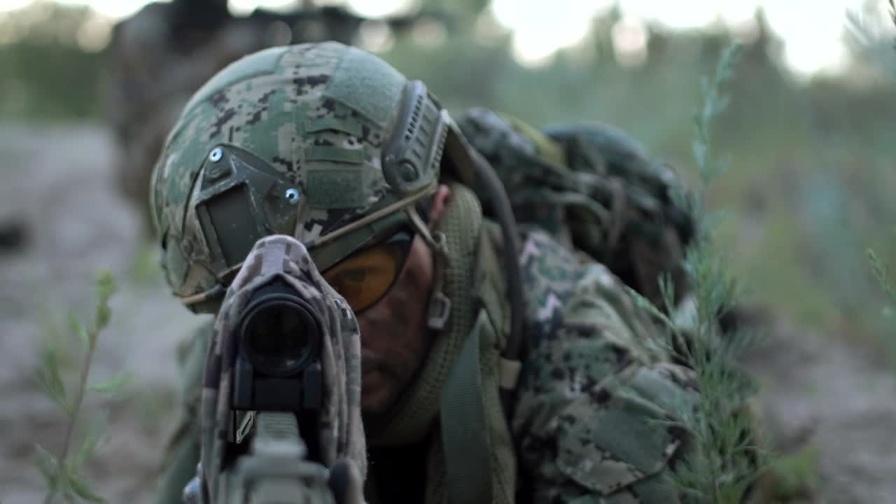 Stock Video A Sniper Laying On The Ground Is Aiming Live Wallpaper For PC