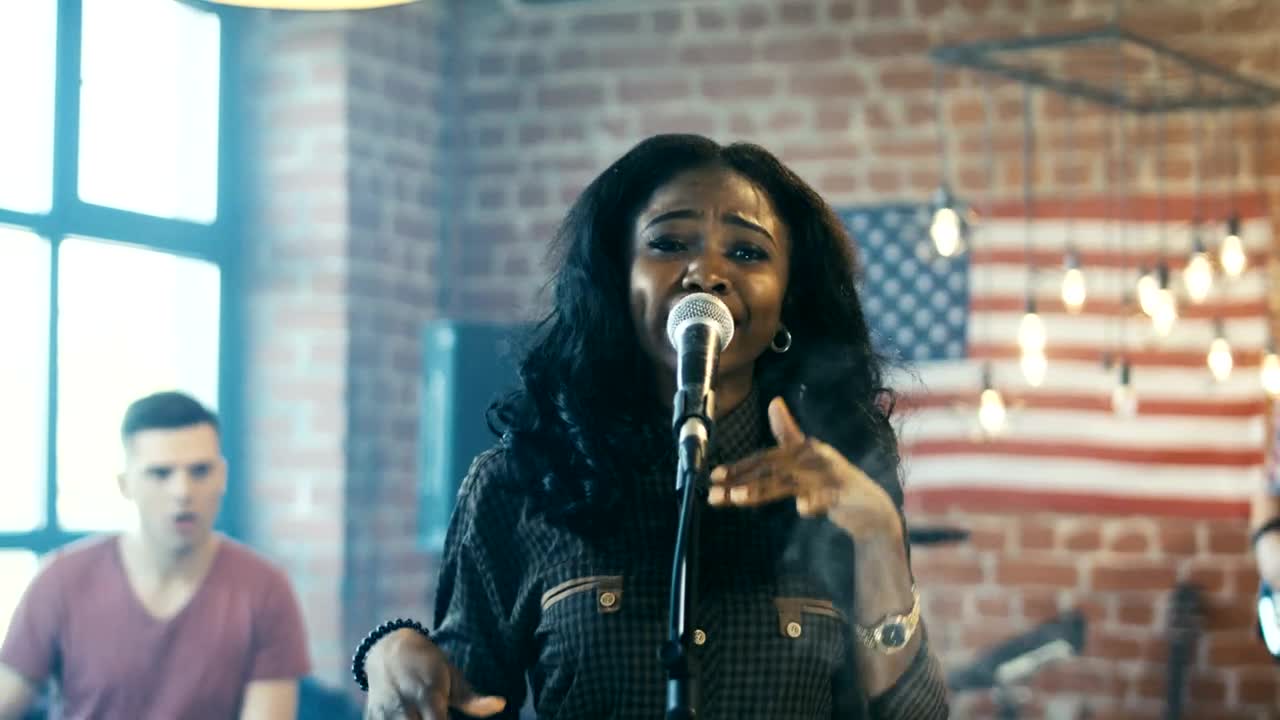 Stock Video A Singer Performing With A Band Indoors Live Wallpaper For PC
