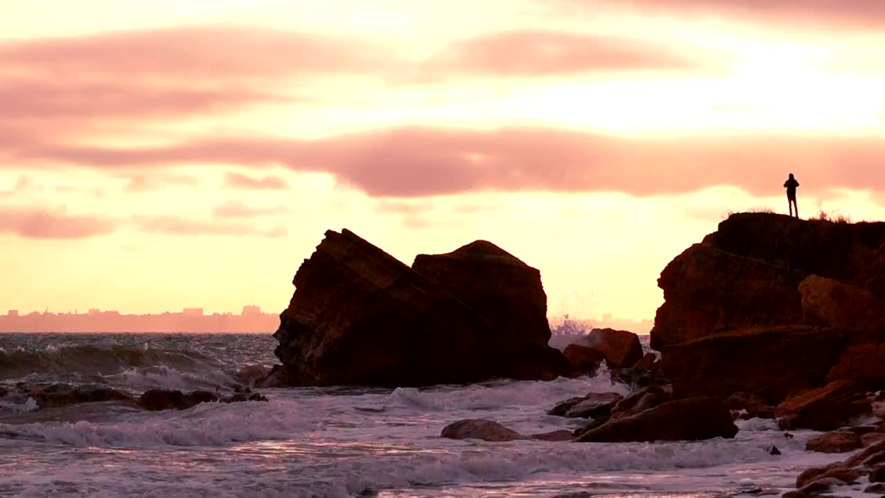 Stock Video A Silhouette Of A Person Over A Rock In The Live Wallpaper For PC