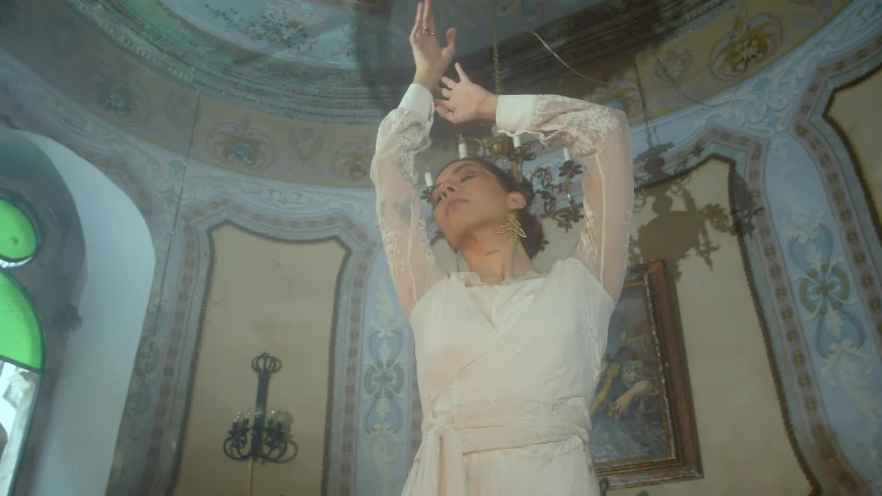 Stock Video A Redhead Woman Is Dancing And Modeling In A Victorian Live Wallpaper For PC