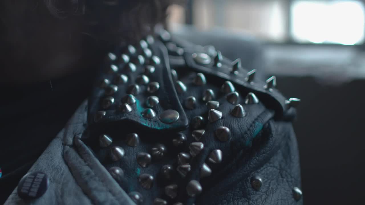 Stock Video A Punk Man Wearing A Jacket With Studs Closeup Live Wallpaper For PC