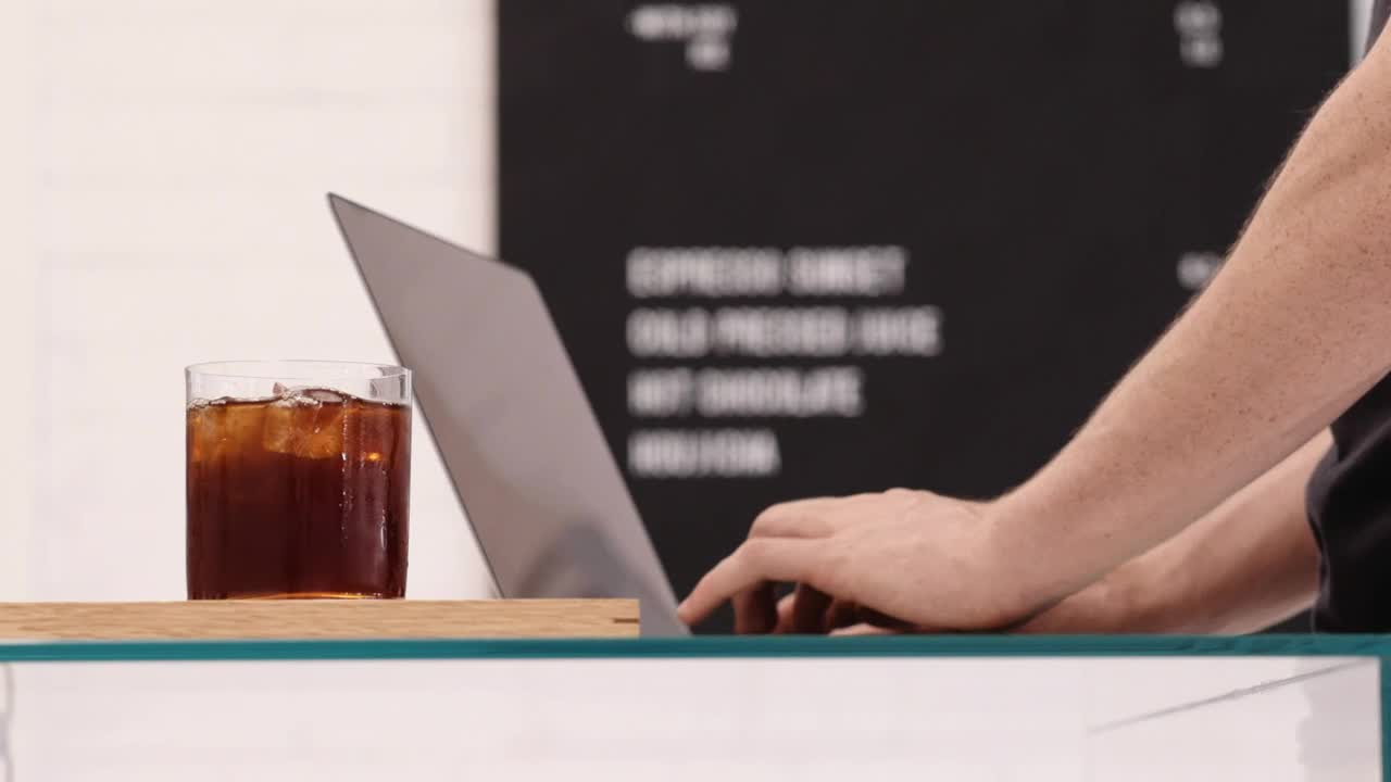 Stock Video A Person Working While Drinking Coffee Live Wallpaper For PC