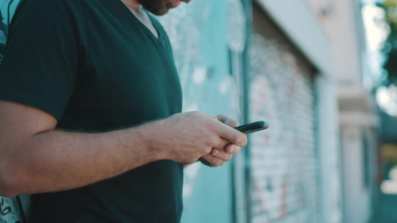 Stock Video A Person Texting On A Smartphone At The Street Live Wallpaper For PC