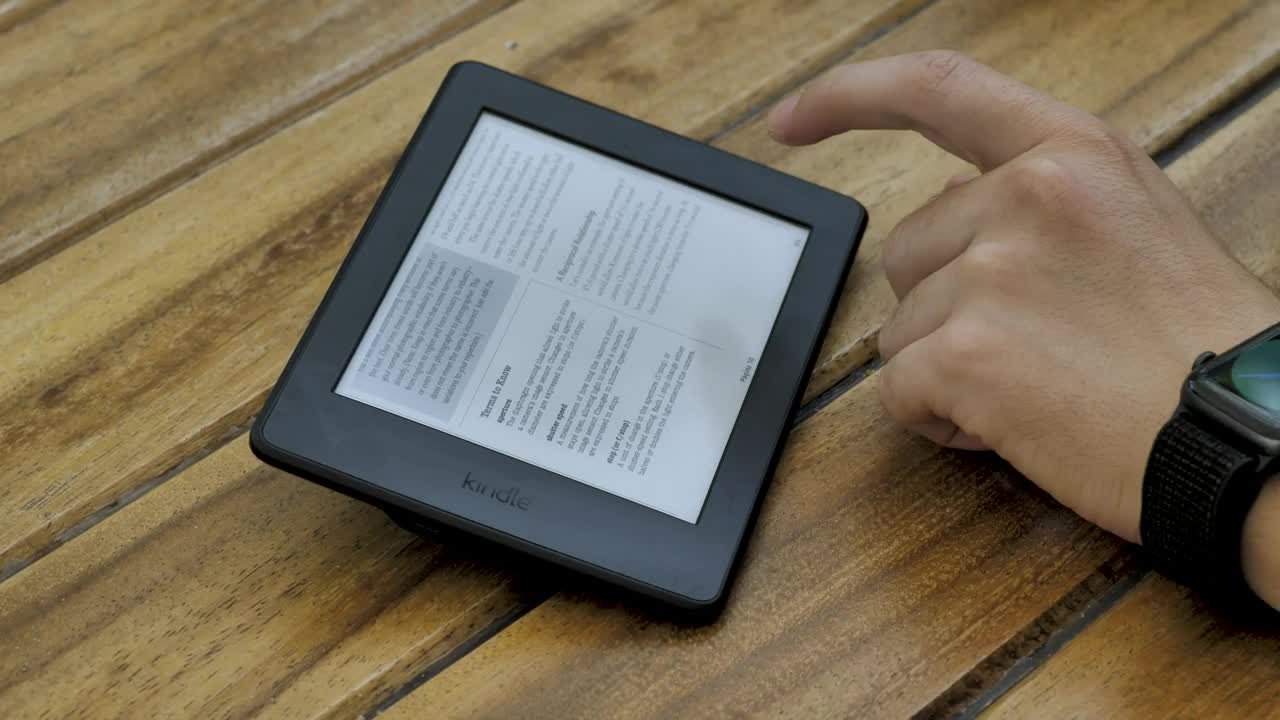 Stock Video A Person Reading An Ebook On A Tablet Live Wallpaper For PC