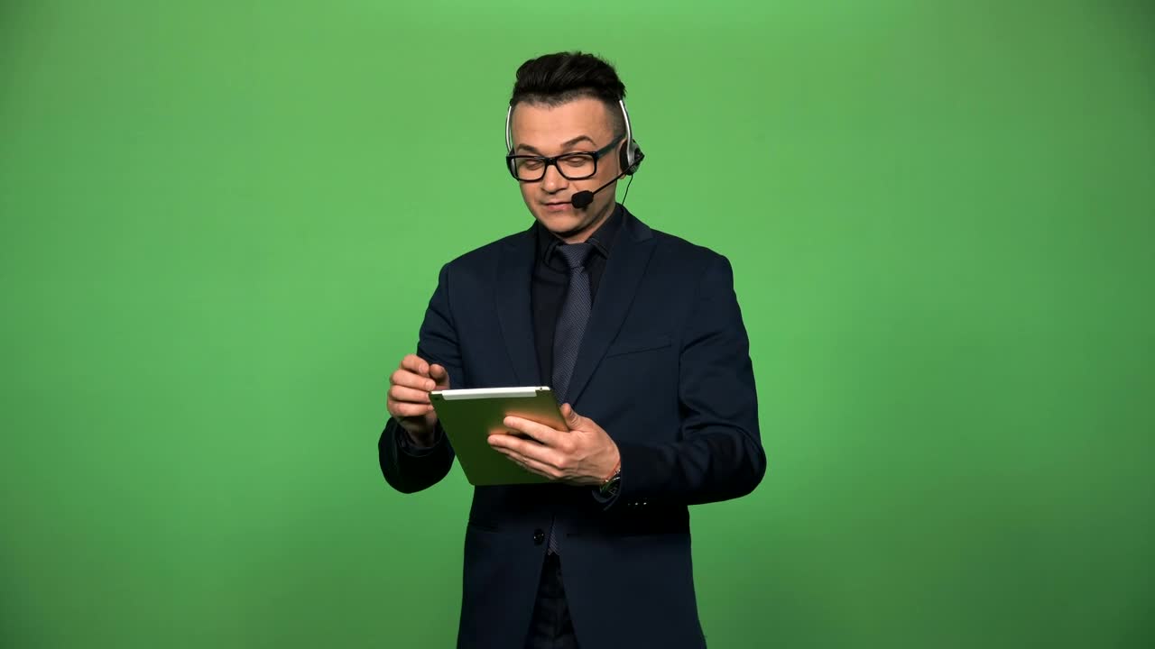 Stock Video A Newscaster With Tablet And Headset Live Wallpaper For PC