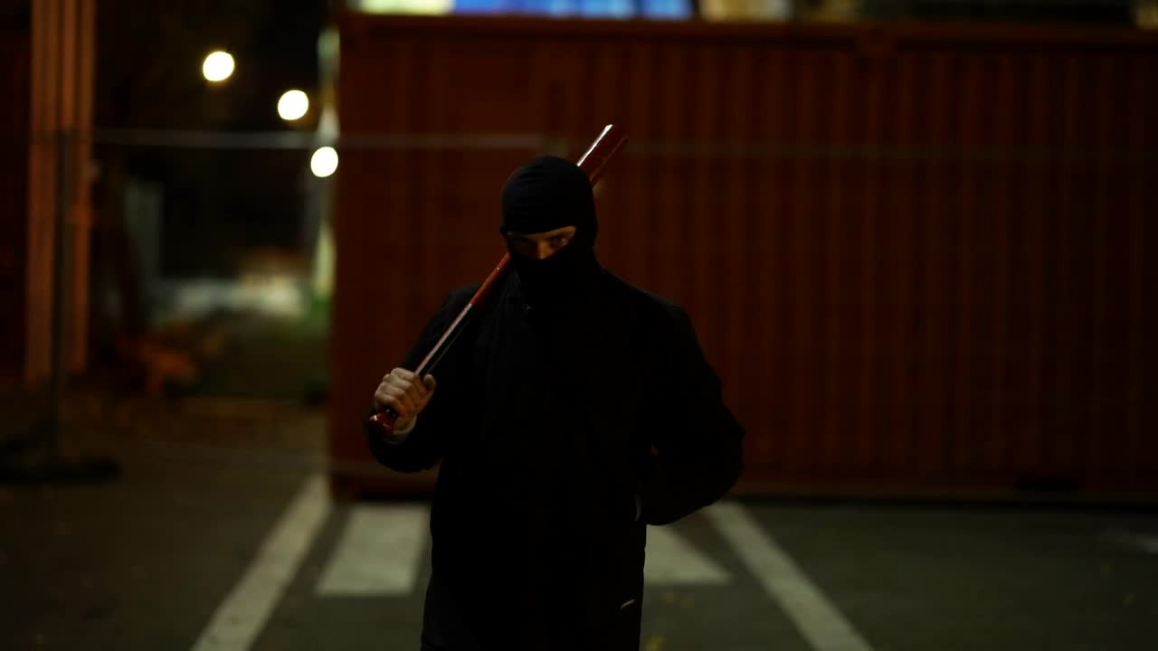Stock Video A Menacing Gangster Walking With A Baseball Bat Live Wallpaper For PC