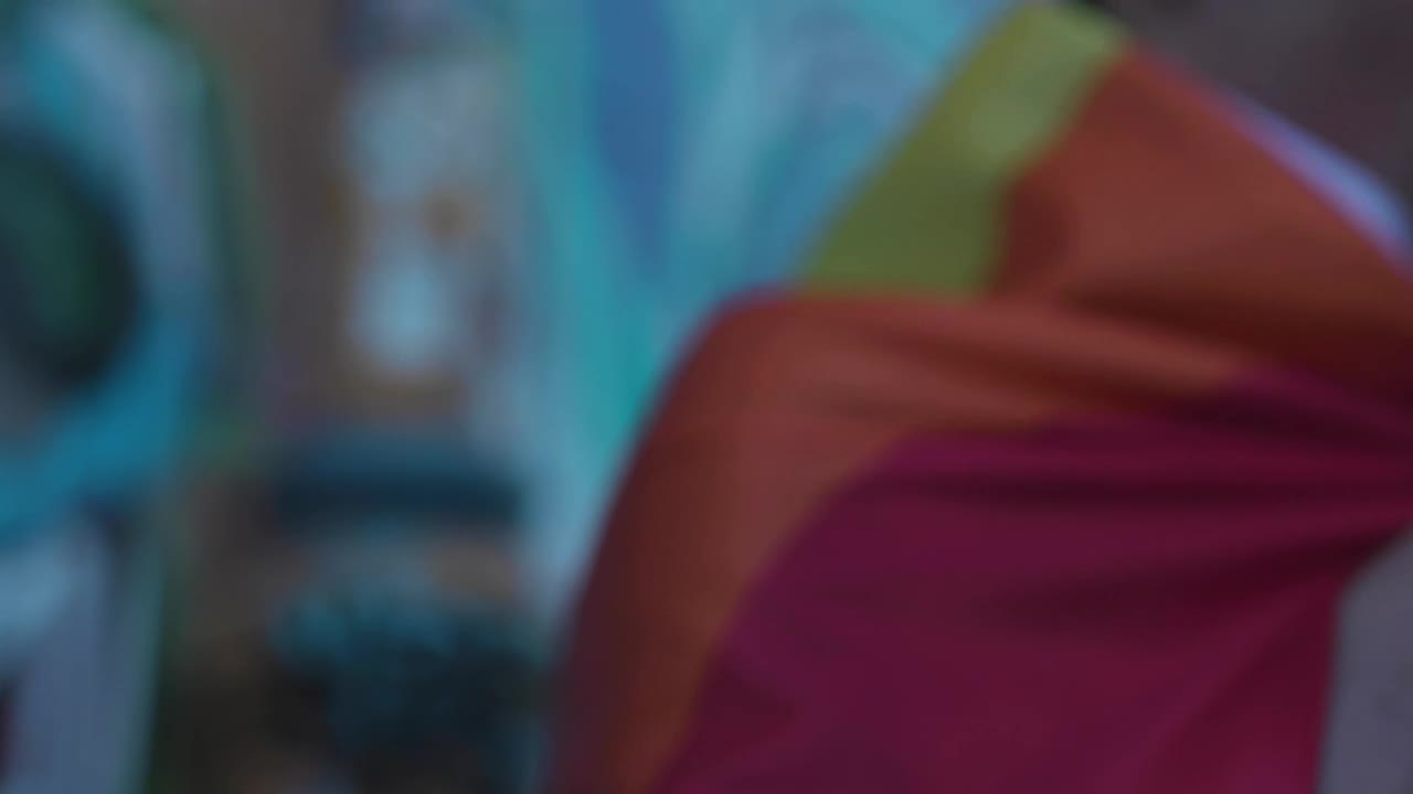 Stock Video A Man Wearing A Rainbow Flag Cape Live Wallpaper For PC
