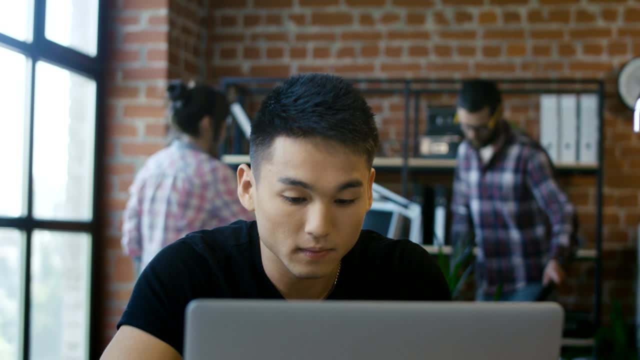 Stock Video A Man Using A Computer In The Office Live Wallpaper For PC