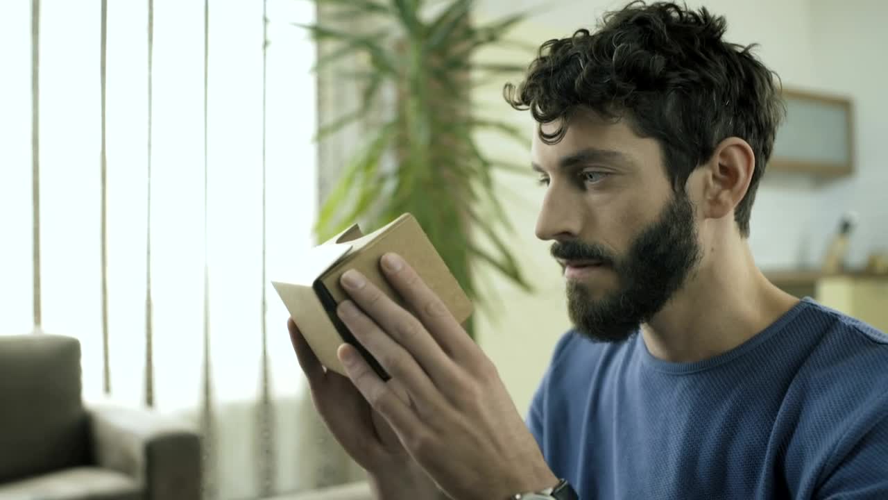 Stock Video A Man Using A Cardboard Vr Headset Live Wallpaper For PC