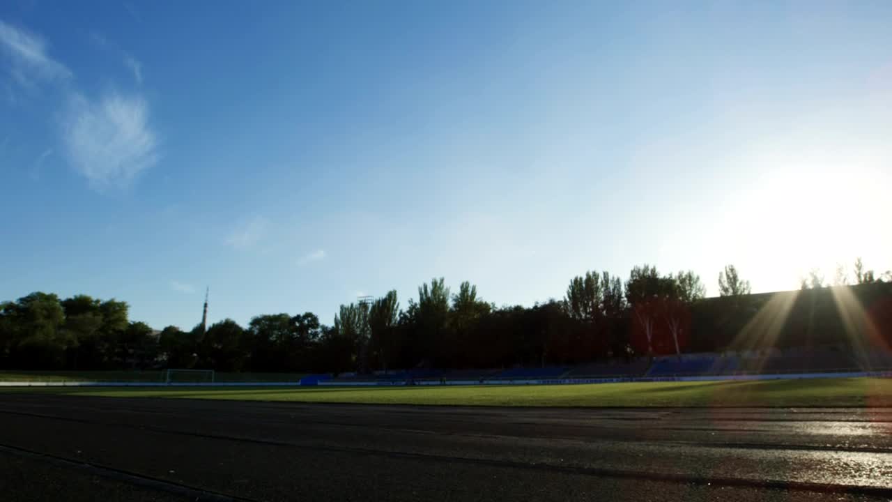 Stock Video A Man Trainign In A Running Track Field Live Wallpaper For PC