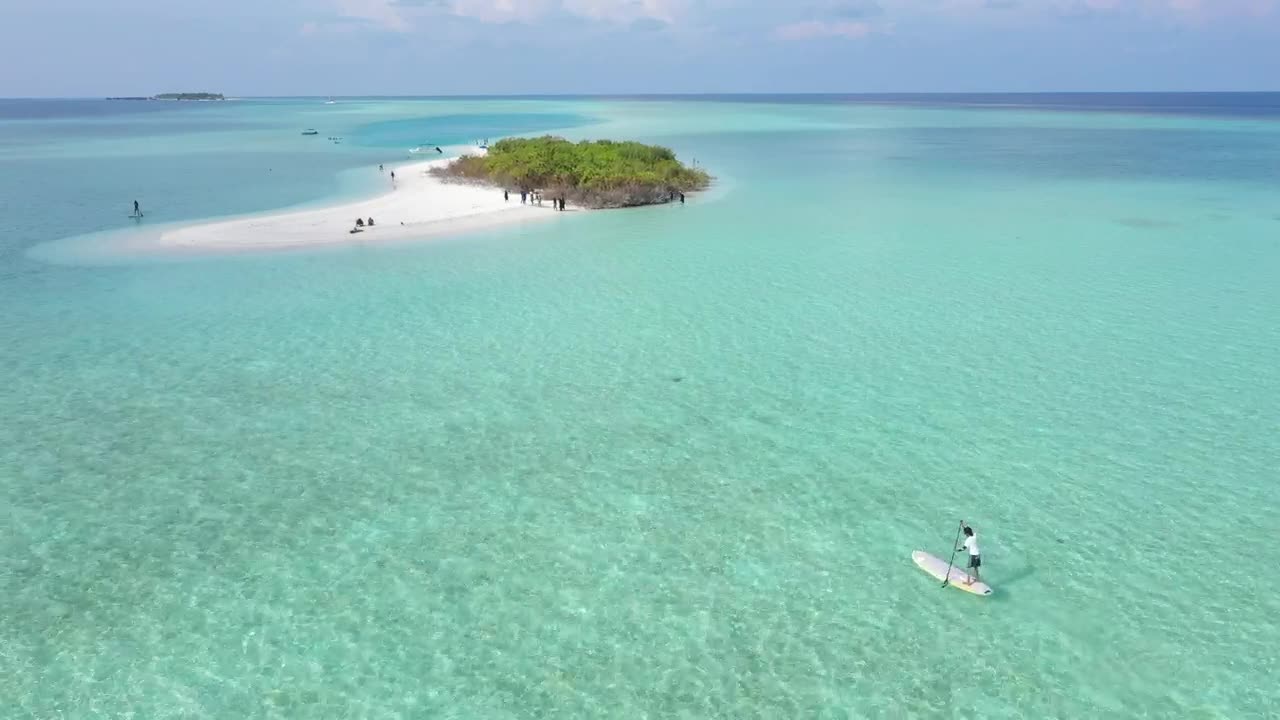 Stock Video A Man Paddling On A Board To Get To A Live Wallpaper For PC