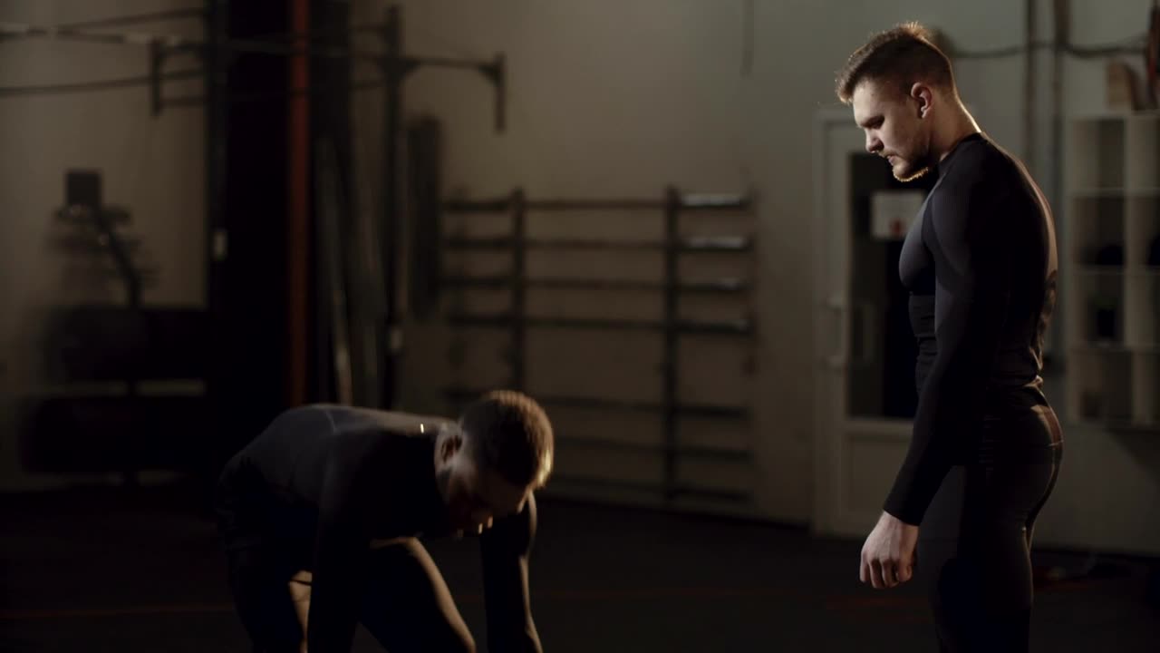 Stock Video A Man Lifting Weights With Trainer Instructions Live Wallpaper For PC