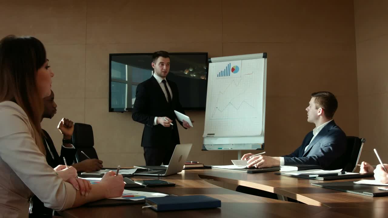 Stock Video A Man Is Presenting A Business Report Live Wallpaper For PC
