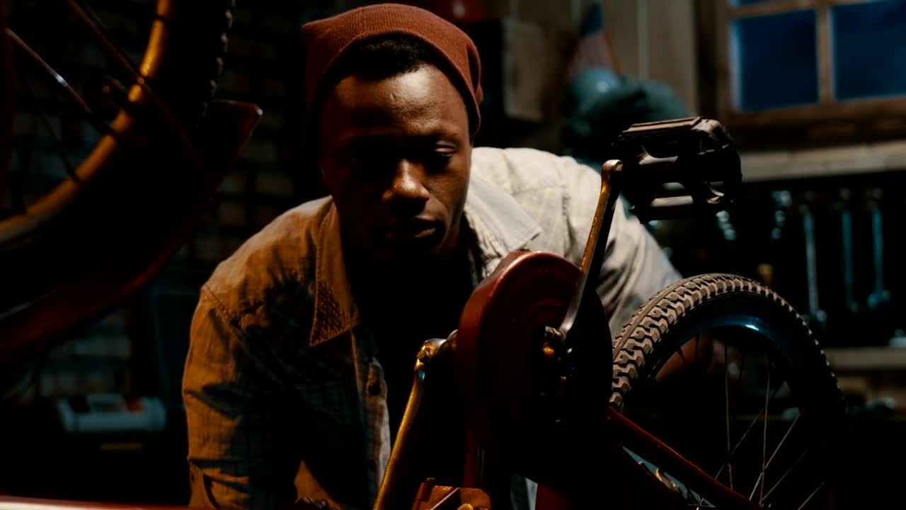 Stock Video A Man Fixing A Bag In The Garage Live Wallpaper For PC