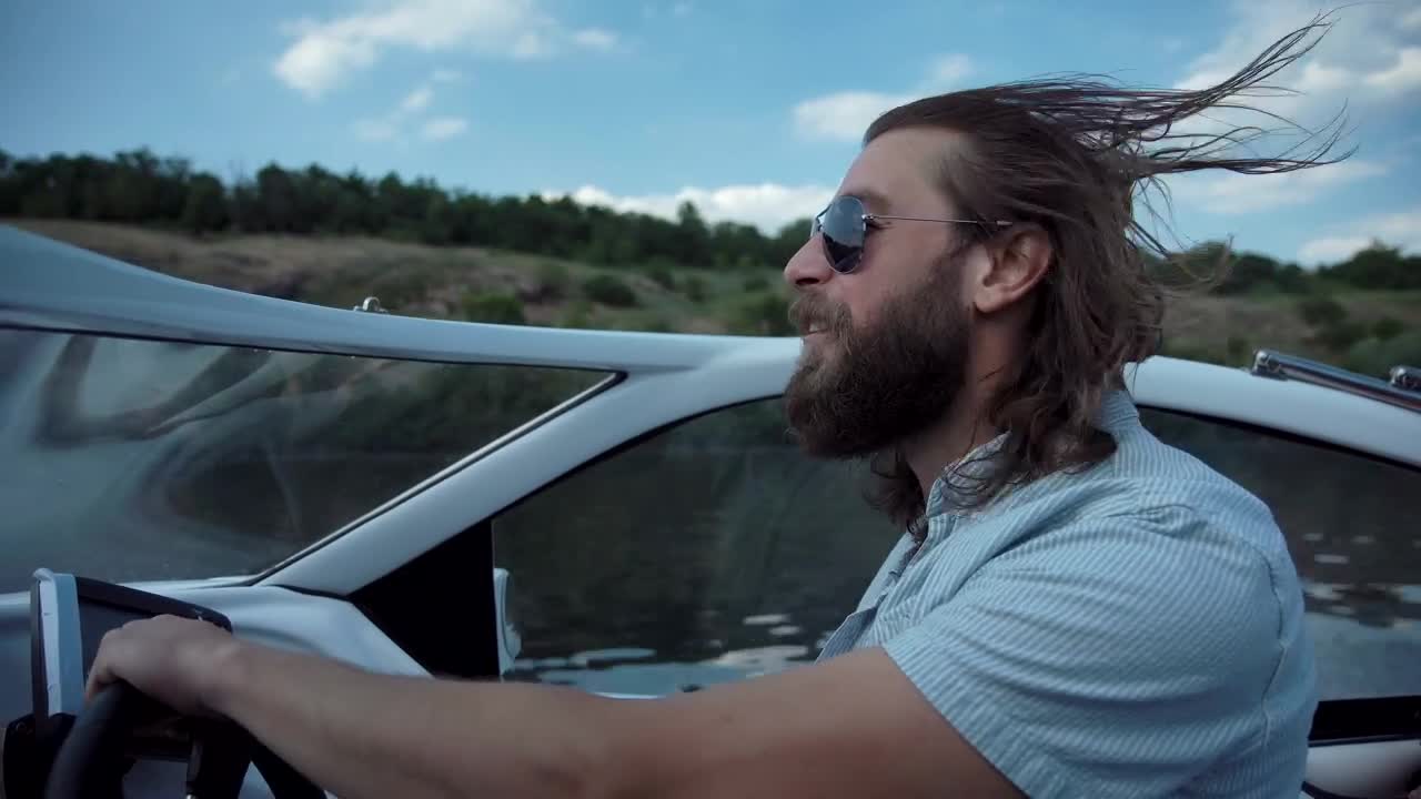 Stock Video A Man Driving A Speedboat In The Lake Live Wallpaper For PC