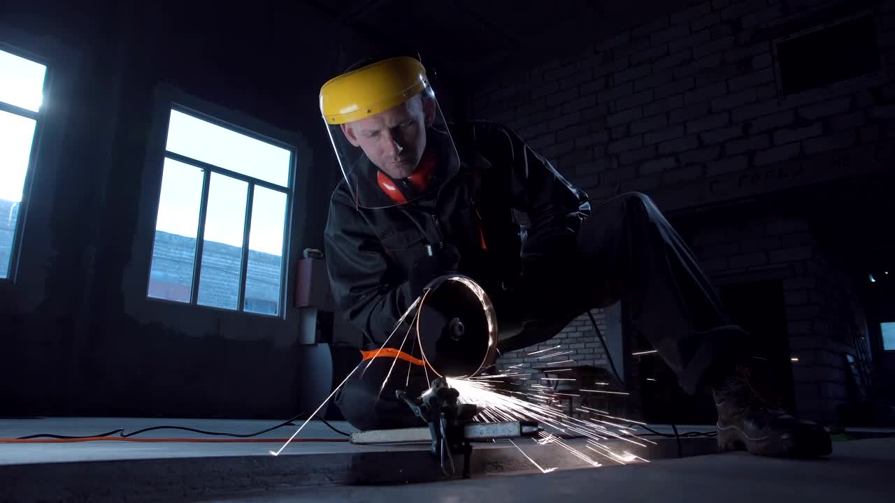 Stock Video A Man Cutting Metal With Machine Live Wallpaper For PC