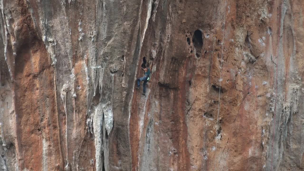Stock Video A Man Climbing A Cliff Live Wallpaper For PC