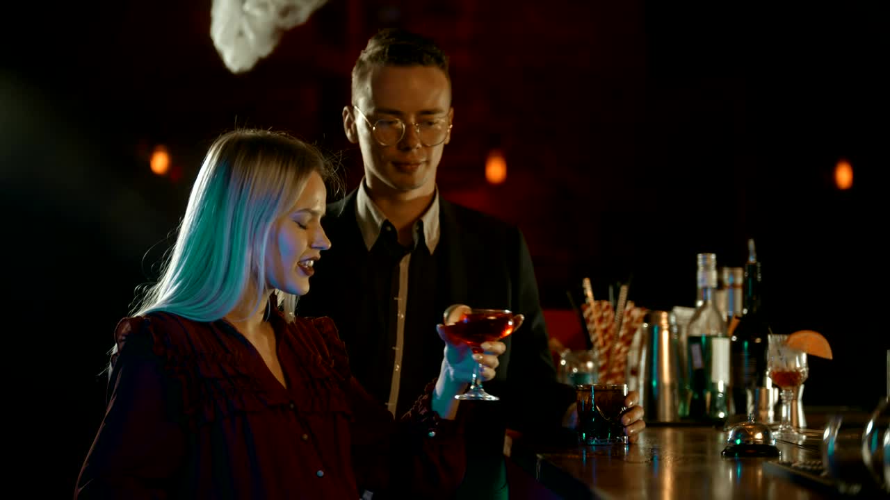 Stock Video A Man And A Woman Chatting At A Bar Counter Live Wallpaper For PC
