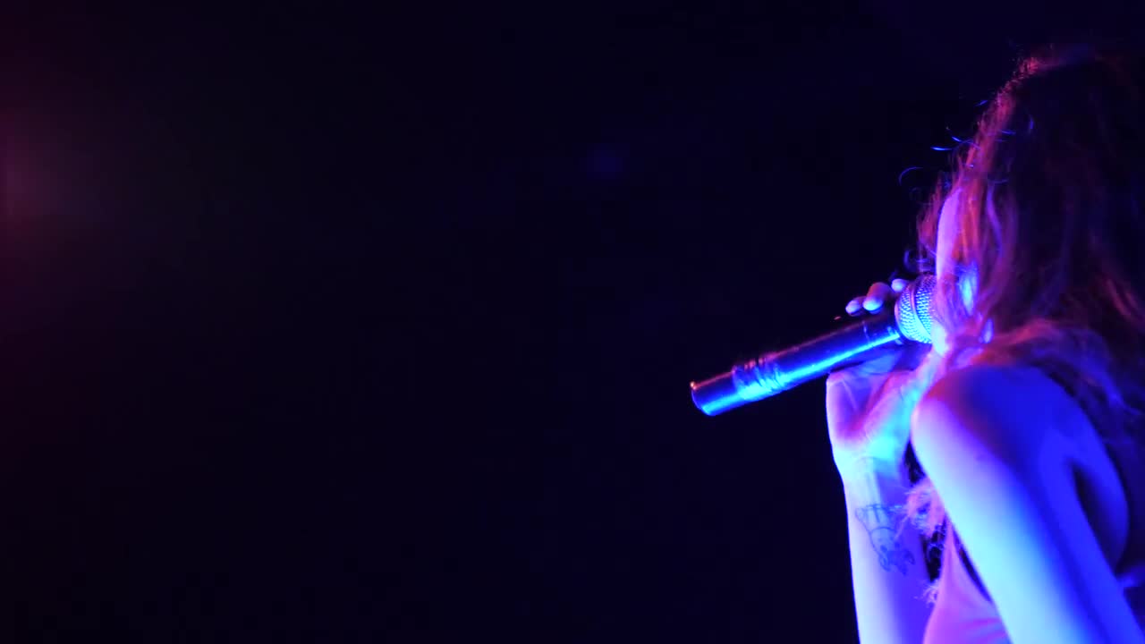 Stock Video A Long Haired Woman Singing On Stage Live Wallpaper For PC