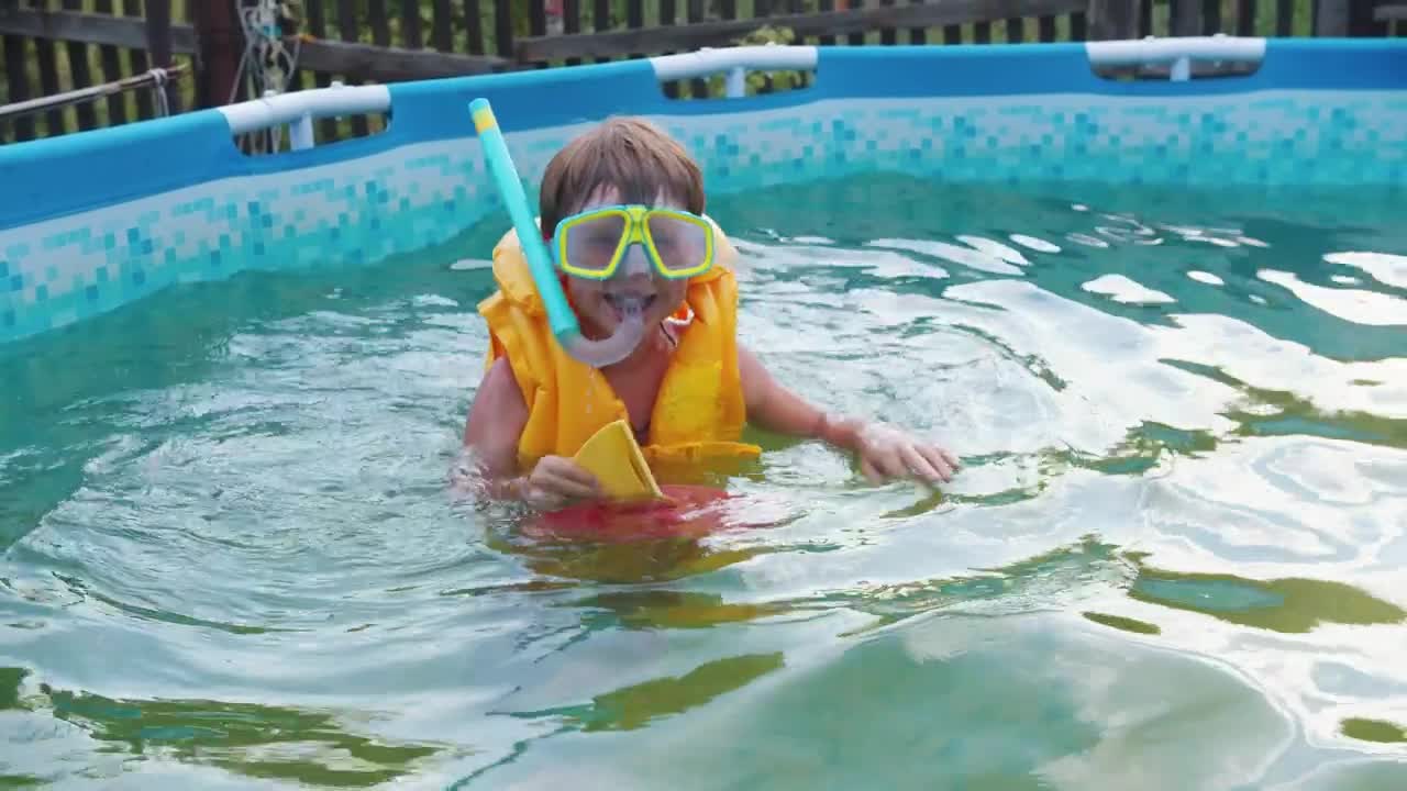 Stock Video A Little Boy Swimming In An Inflatable Pool Live Wallpaper For PC