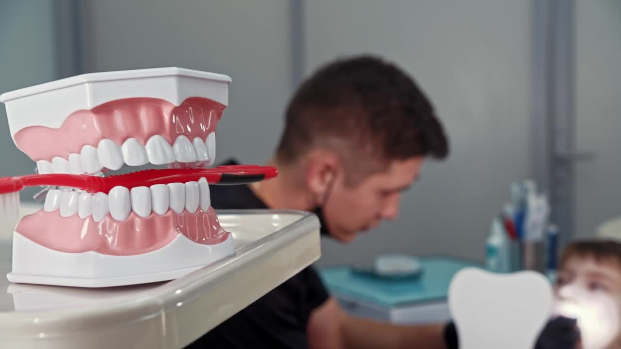 Stock Video A Little Boy Having Treatment With The Dentist Live Wallpaper For PC