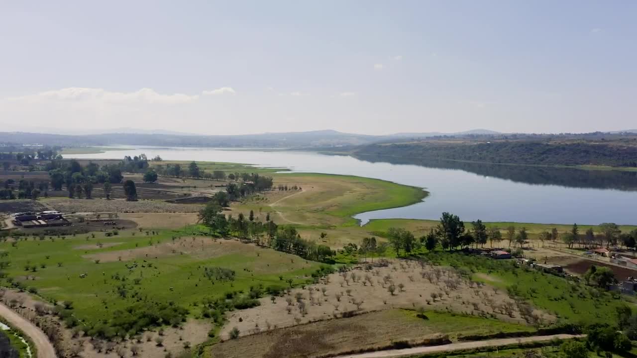 Stock Video A Lake Next To Agriculture Fields Live Wallpaper For PC