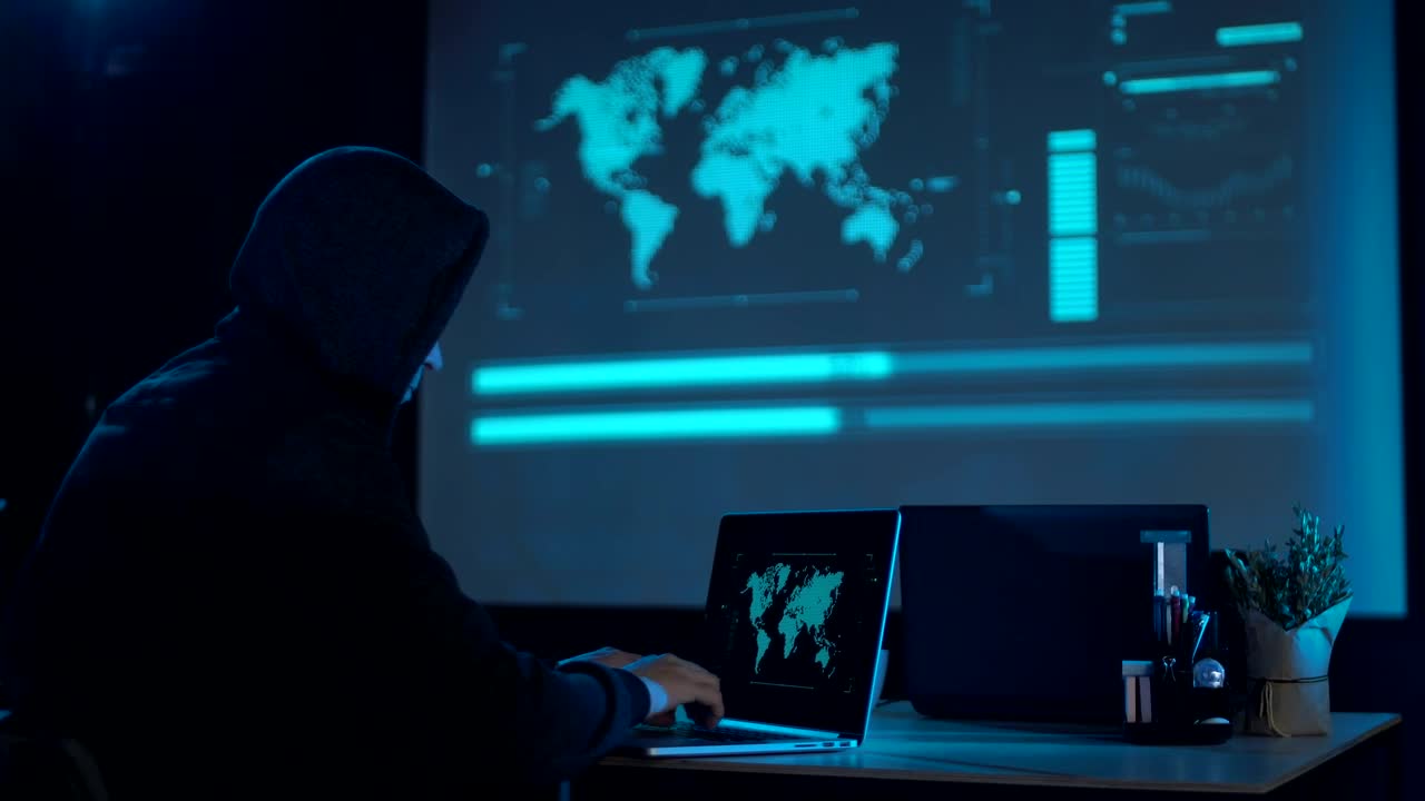Stock Video A Hacker With The Laptop In A Dark Room Live Wallpaper For PC