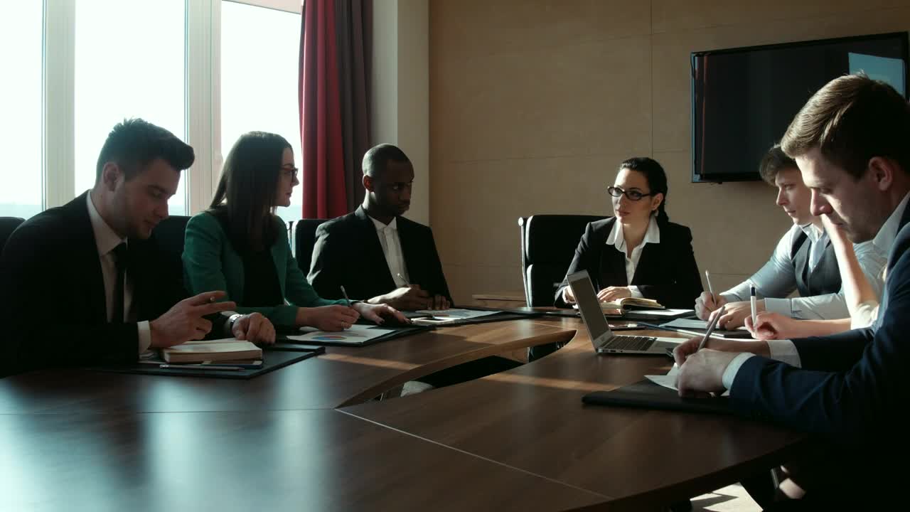 Stock Video A Group Of Businessmen In A Conference Room Live Wallpaper For PC
