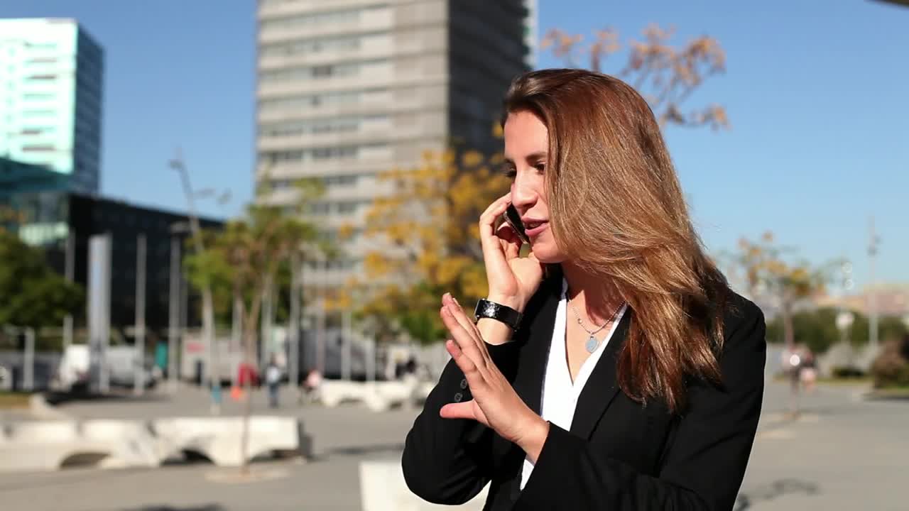 Stock Video Business Woman Schedules An Appointment By Phone Live Wallpaper For PC