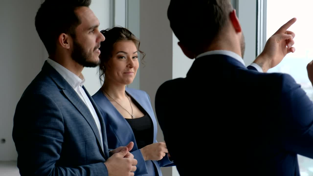 Stock Video Business Team Talking By Skyscraper Window Live Wallpaper For PC