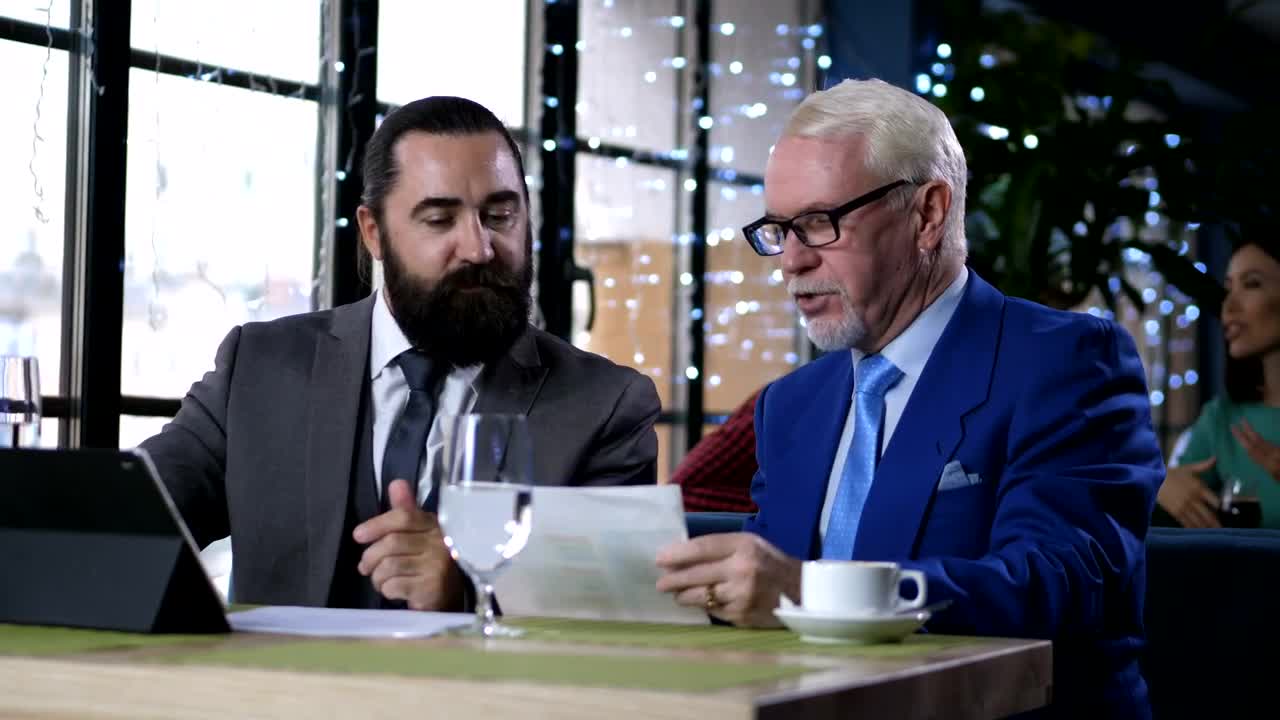 Stock Video Business Partners Talking In A Cafe Live Wallpaper For PC