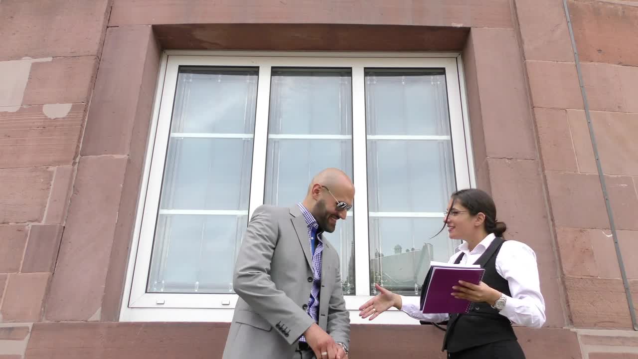 Stock Video Business Man And Woman Greeting Each Other Outdoor Before A Live Wallpaper For PC